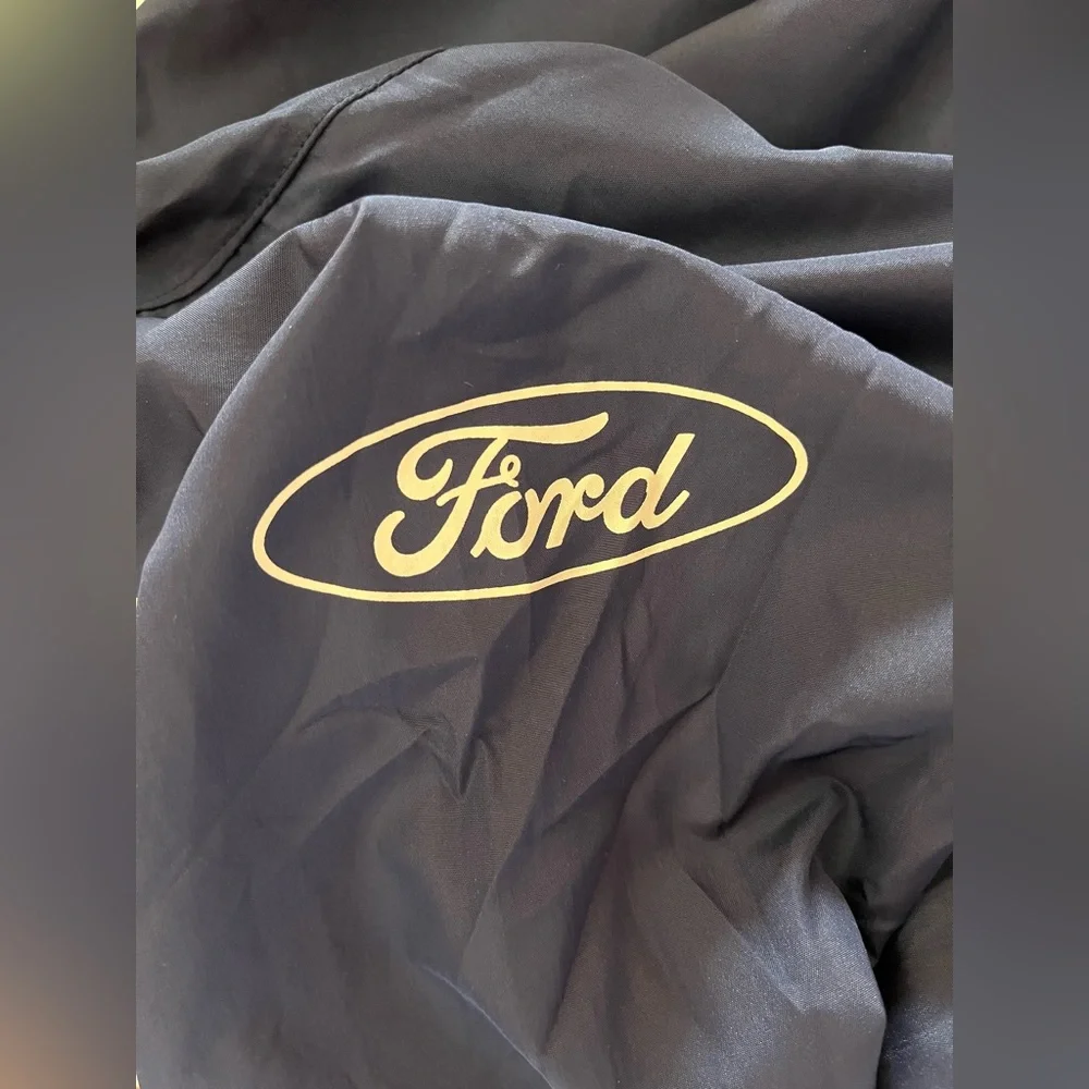 Minnesota Twins hooded windbreaker with “Ford” on 1 sleeve, 2XL